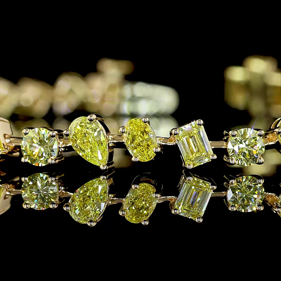 5ctw Prong Inclined Pear, Emerald & Oval Station Bracelet