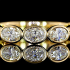 1-1/4ctw Bezel East West Oval 3/4 Eternity Band