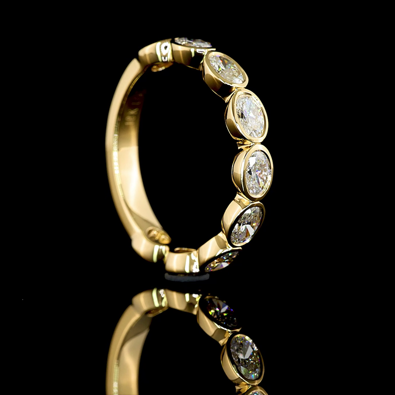 1-1/4ctw Bezel East West Oval 3/4 Eternity Band