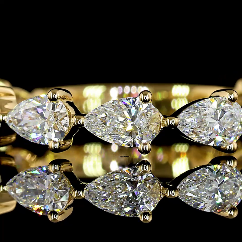 1-1/4ctw Prong East West Pear 3/4 Eternity Band