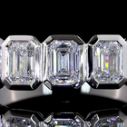 1-3/4ctw Bezel Emerald Seven Stone Band