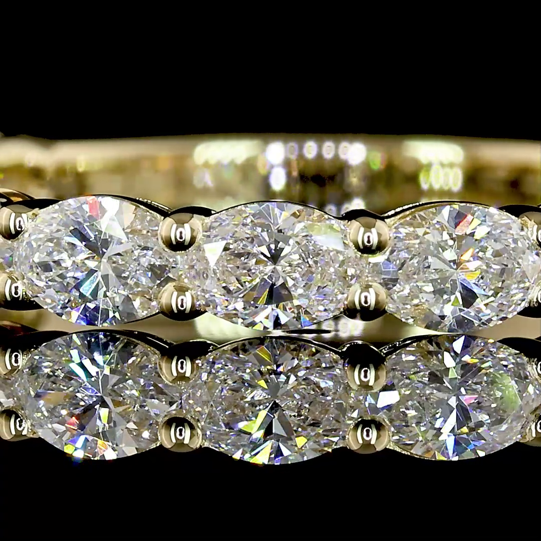 1-1/4ctw Prong East West Oval 3/4 Eternity Band