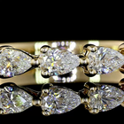 1/2ctw Prong East West Pear Seven Stone Band