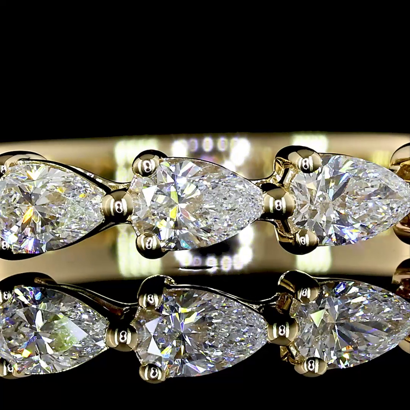 1/2ctw Prong East West Pear Seven Stone Band