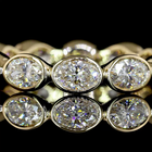 1-3/4ctw Bezel East West Oval Eternity Band