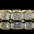 1-1/4ctw Bezel East West Radiant Eternity Band