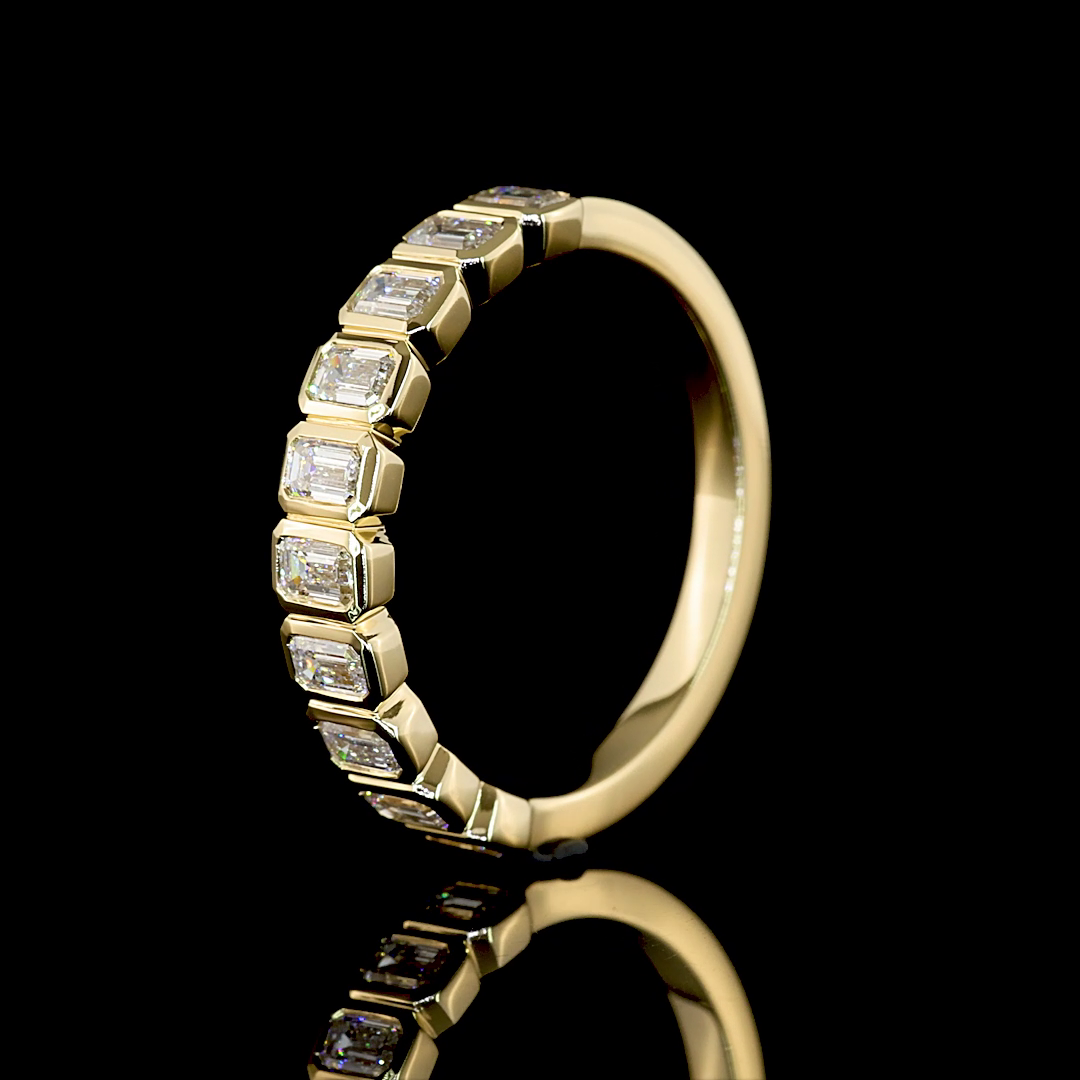 3/4ctw Bezel Emerald Half Eternity Band