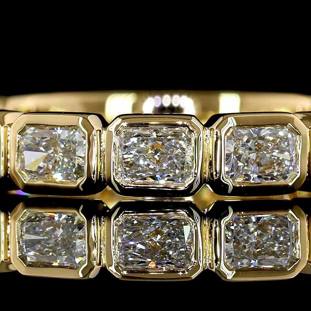 1-1/2ctw Bezel East West Radiant 3/4 Eternity Band