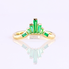 Tapered Baguette Green Emerald Half Bezel Seven Stone Band