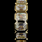 1-3/4ctw Bezel East West Emerald Huggie Earrings