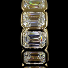 3-1/2ctw Bezel East West Emerald Huggie Earrings