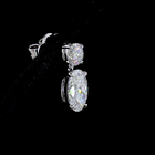 2-1/2ctw Prong Oval & Round Hanging Earrings