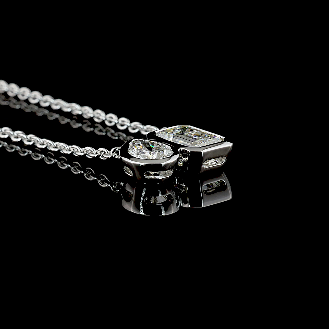 2-3/4ctw Bezel Emerald & Pear Toi et Moi Pendant