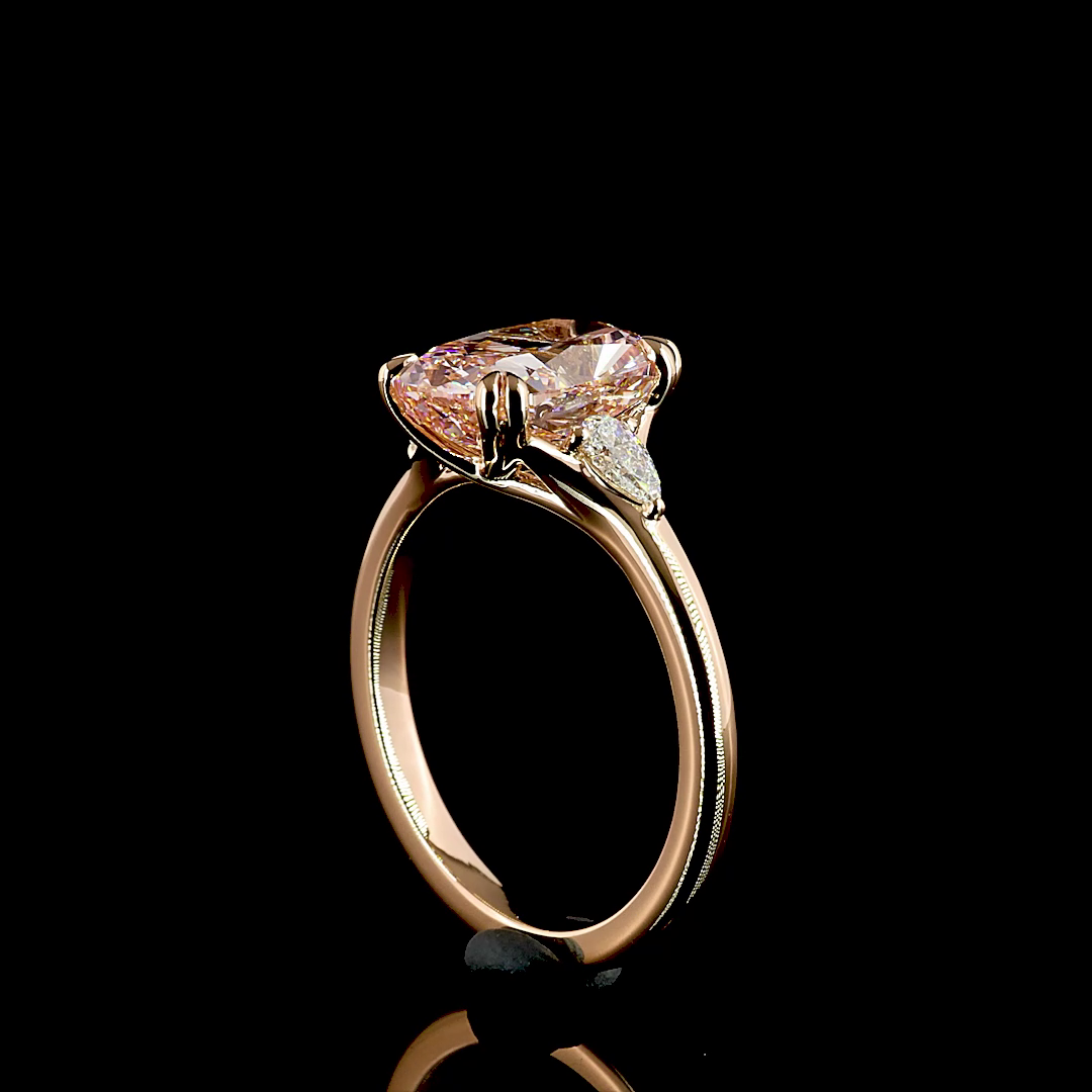 2-3/4ct Fancy Pink Cushion Three Stone Engagement Ring.