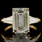 4ct Emerald Three Stone Engagement Ring.