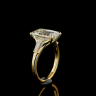 4ct Emerald Three Stone Engagement Ring.