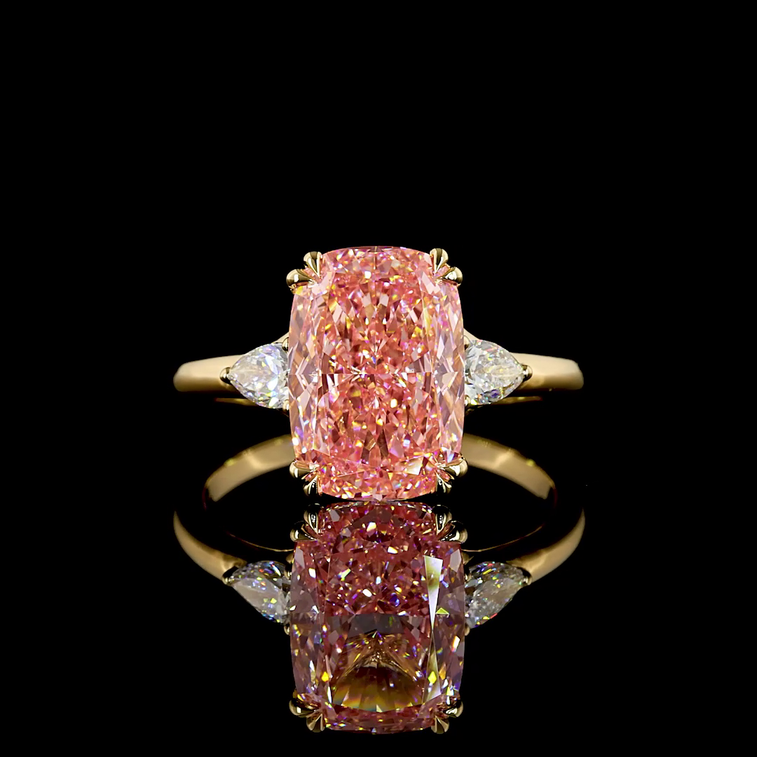 4ct Fancy Pink Cushion Three Stone Engagement Ring.