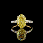 4ct Fancy Yellow Oval Hidden Halo Engagement Ring.