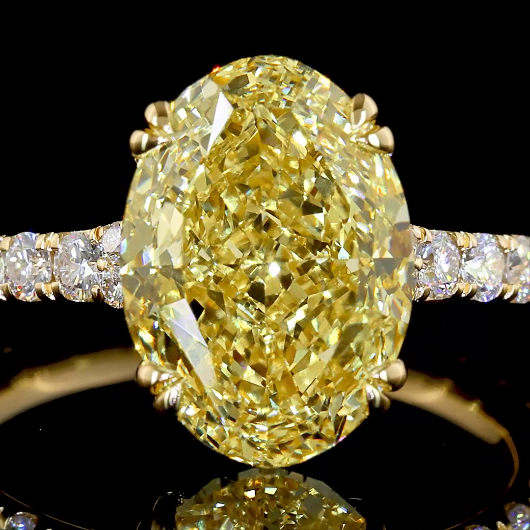 4ct Fancy Yellow Oval Hidden Halo Engagement Ring.