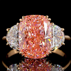 5ct Fancy Pink Cushion Three Stone Engagement Ring.